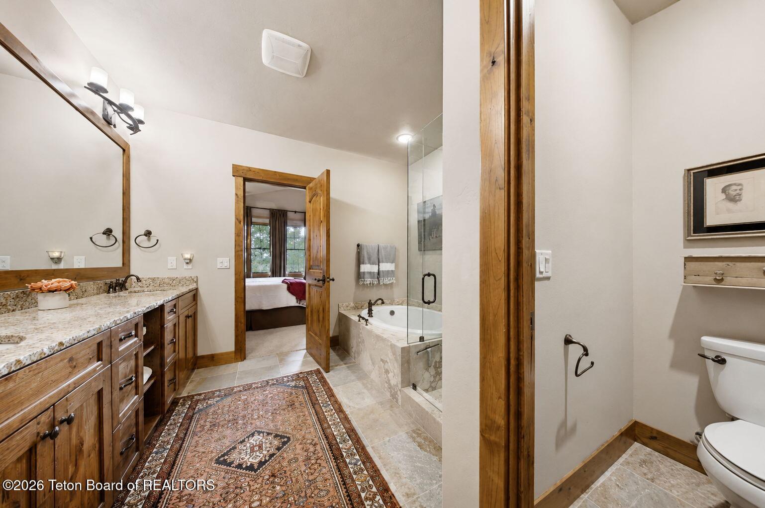 92 Bison Drive Victor, ID 83455 - Photo 16 of 52 12 Primary Bath shows water closet