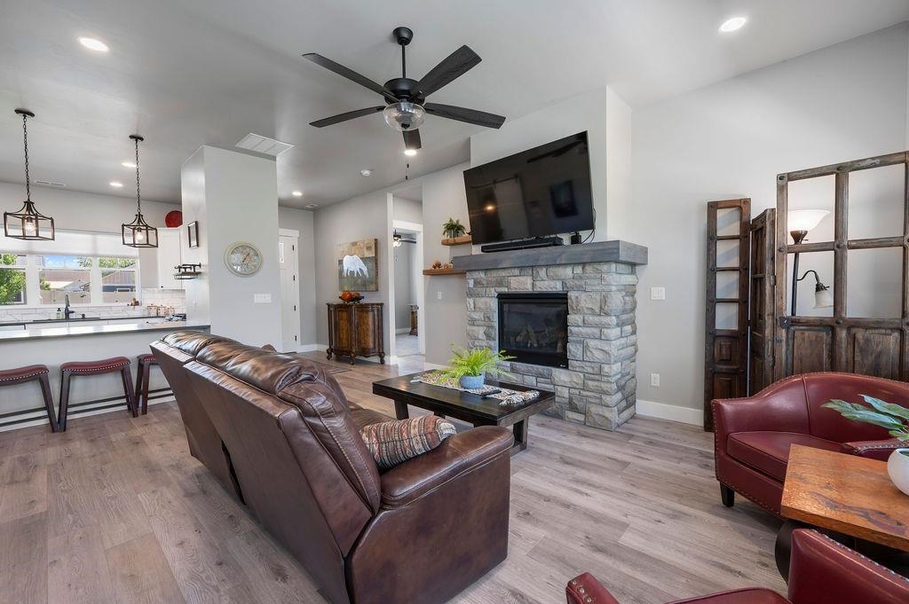 813 Red Apple Road Grand Junction, CO 81505 - Photo 11 of 30 a living room with furniture fireplace and flat screen tv