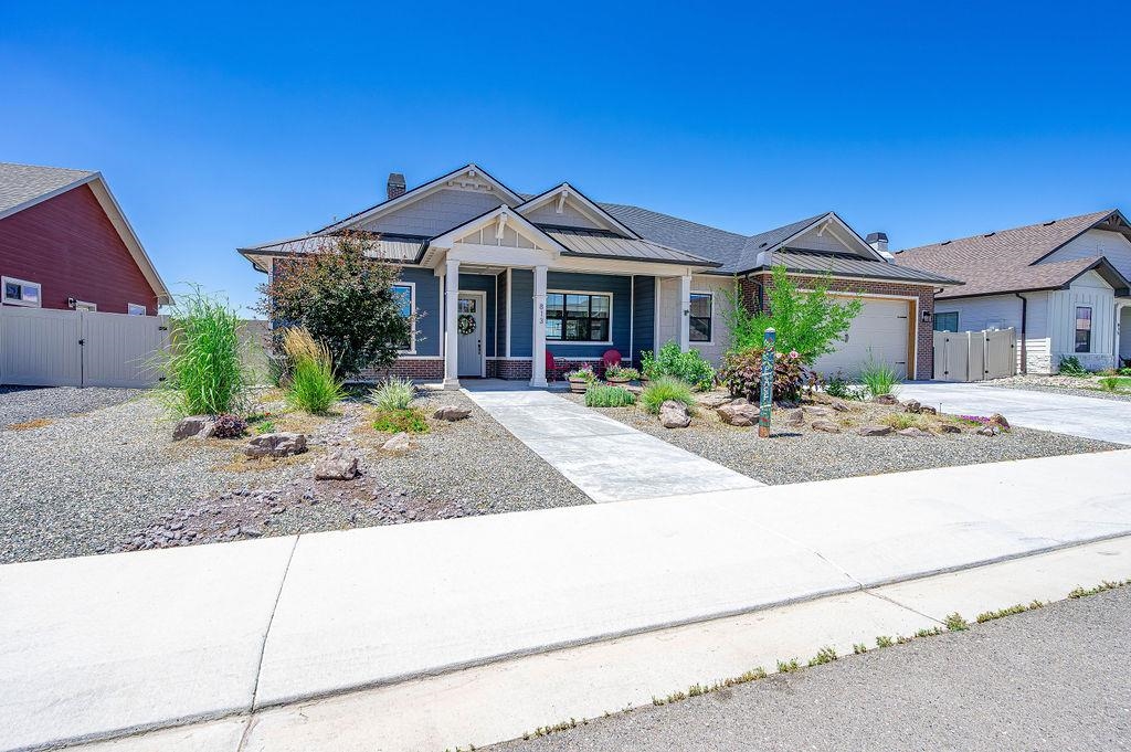 813 Red Apple Road Grand Junction, CO 81505 - Photo 2 of 30 a front view of a house with garden