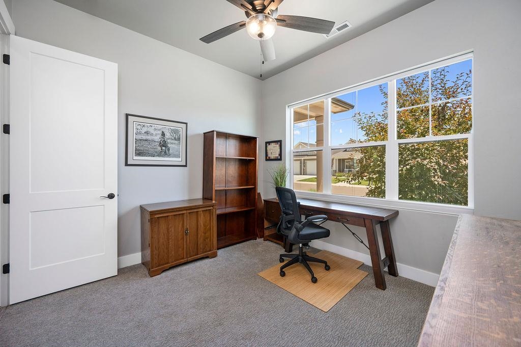 813 Red Apple Road Grand Junction, CO 81505 - Photo 27 of 30 a view of workspace with a window and couch