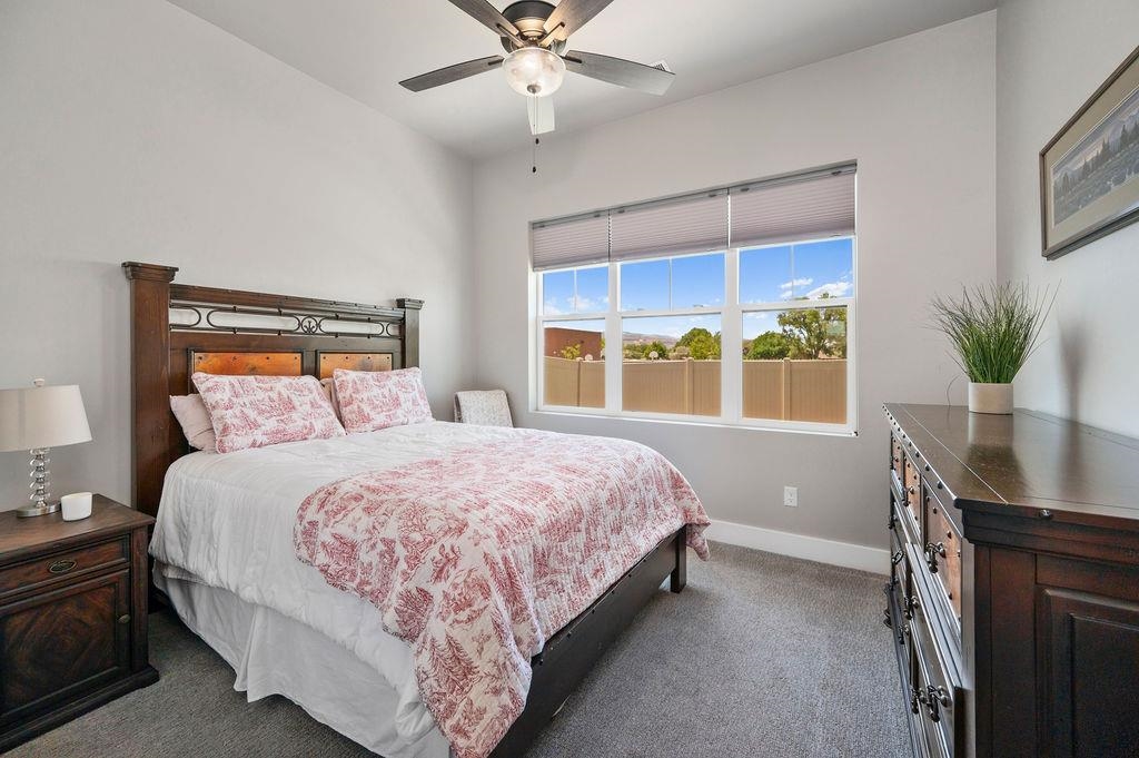 813 Red Apple Road Grand Junction, CO 81505 - Photo 29 of 30 a bedroom with a large bed and a window