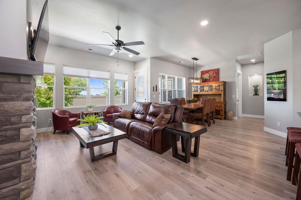 813 Red Apple Road Grand Junction, CO 81505 - Photo 9 of 30 a living room with furniture and a wooden floor