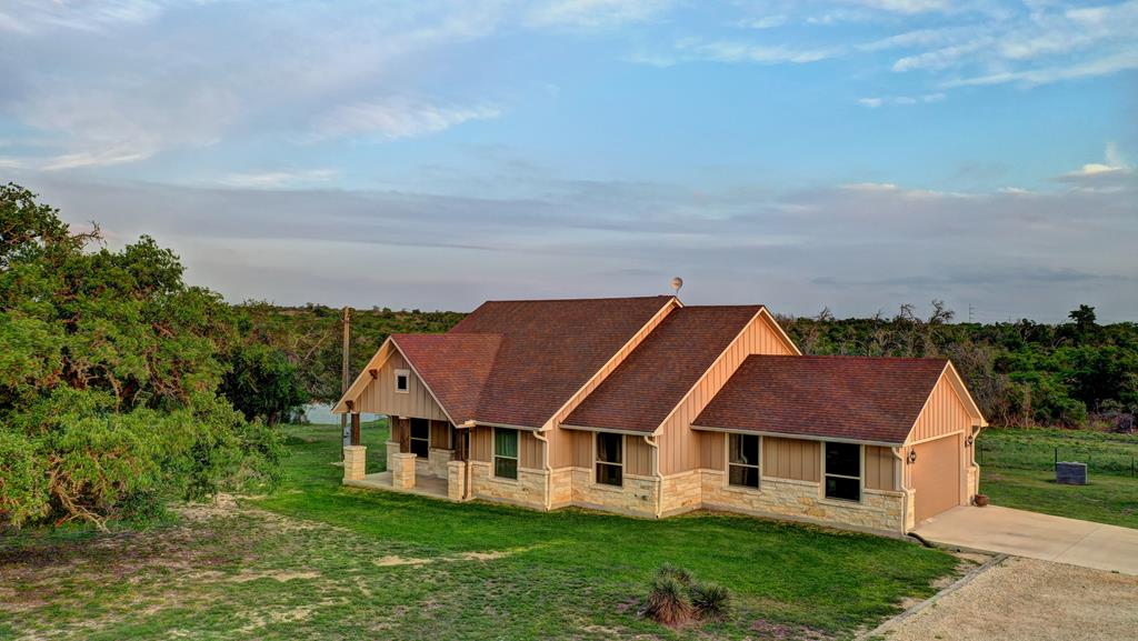 450 Jung Road Harper, TX 78631 - Photo 2 of 50 an aerial view of a house with yard and balcony