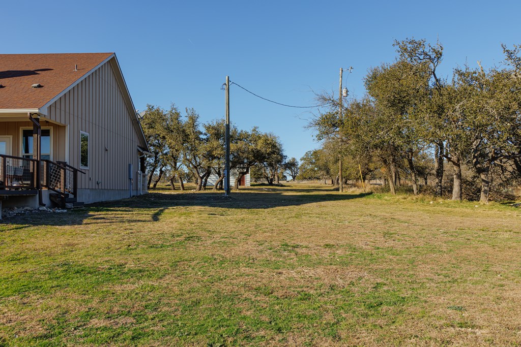 450 Jung Road Harper, TX 78631 - Photo 27 of 50 a view of swimming pool with an outdoor space and seating area
