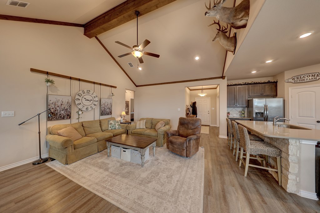 450 Jung Road Harper, TX 78631 - Photo 7 of 50 a living room with furniture and kitchen view