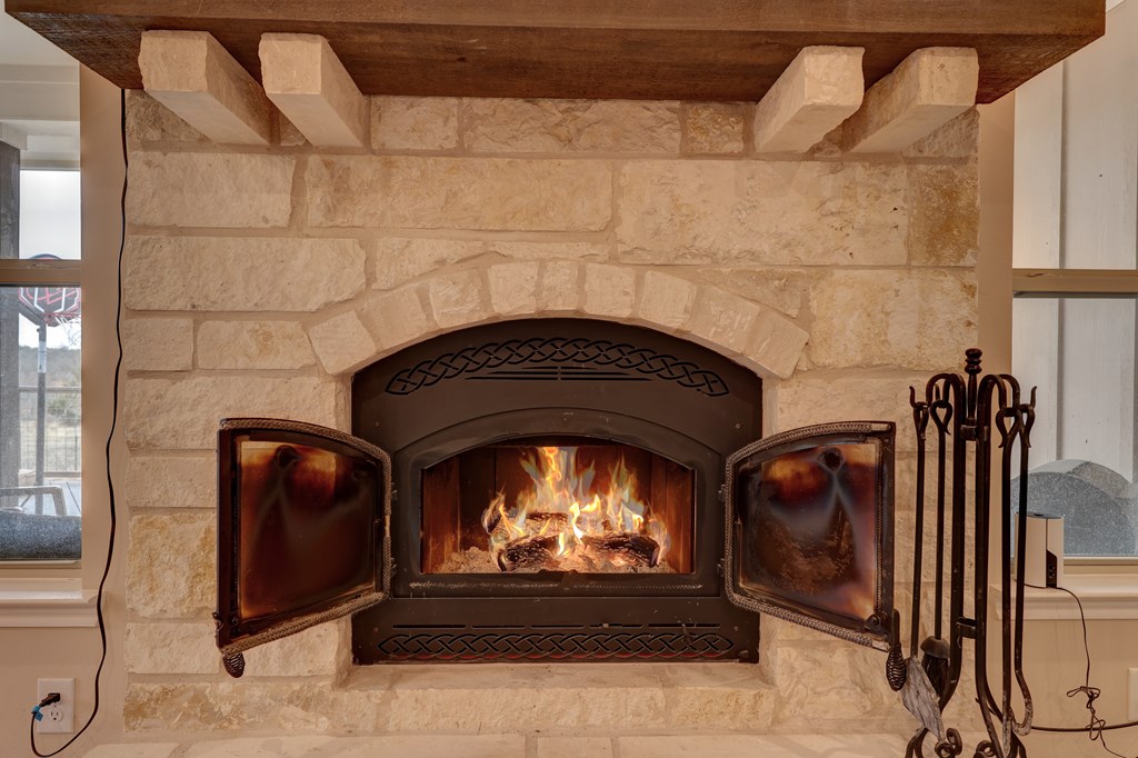 450 Jung Road Harper, TX 78631 - Photo 8 of 50 a living room with a fireplace