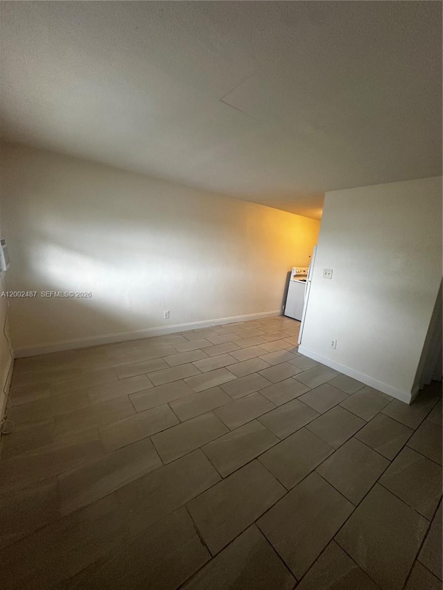 11862 Southwest 212th Street, Unit 11862 Miami, FL 33177 - Photo 14 of 24 a view of empty room