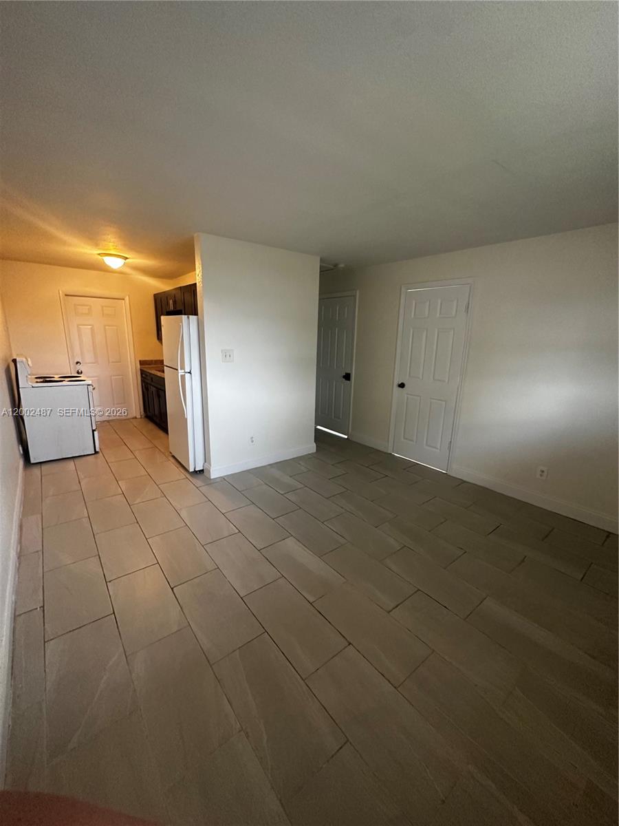 11862 Southwest 212th Street, Unit 11862 Miami, FL 33177 - Photo 16 of 24 a view of a livingroom with an empty space and a sink