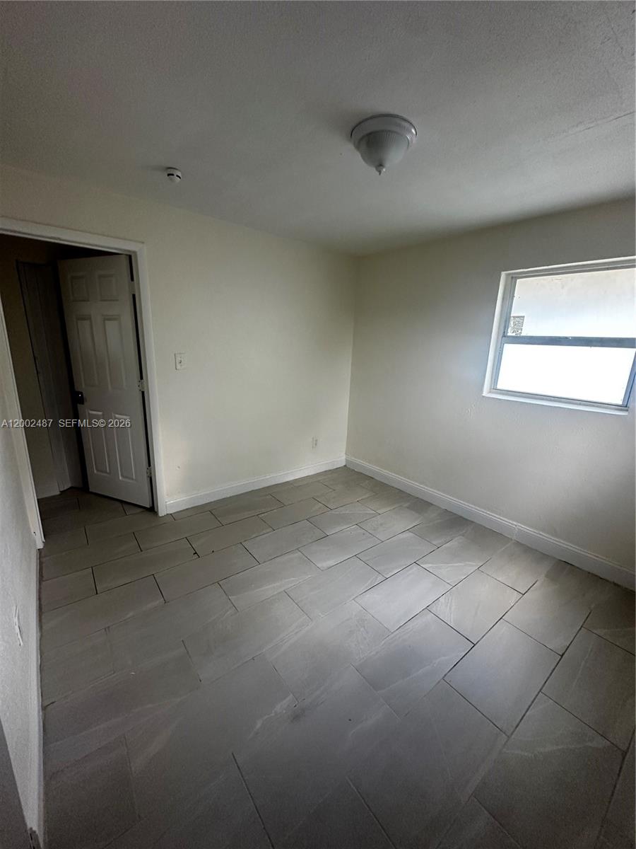 11862 Southwest 212th Street, Unit 11862 Miami, FL 33177 - Photo 10 of 24 a view of empty room