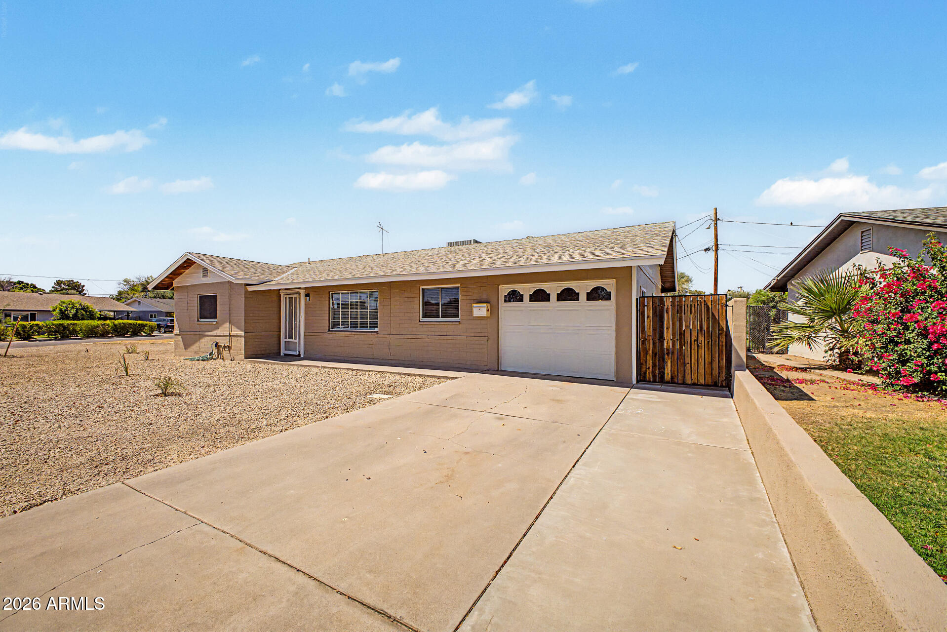 2022 East Monterey Way Phoenix, AZ 85016 - Photo 2 of 29 a front view of a house with a yard