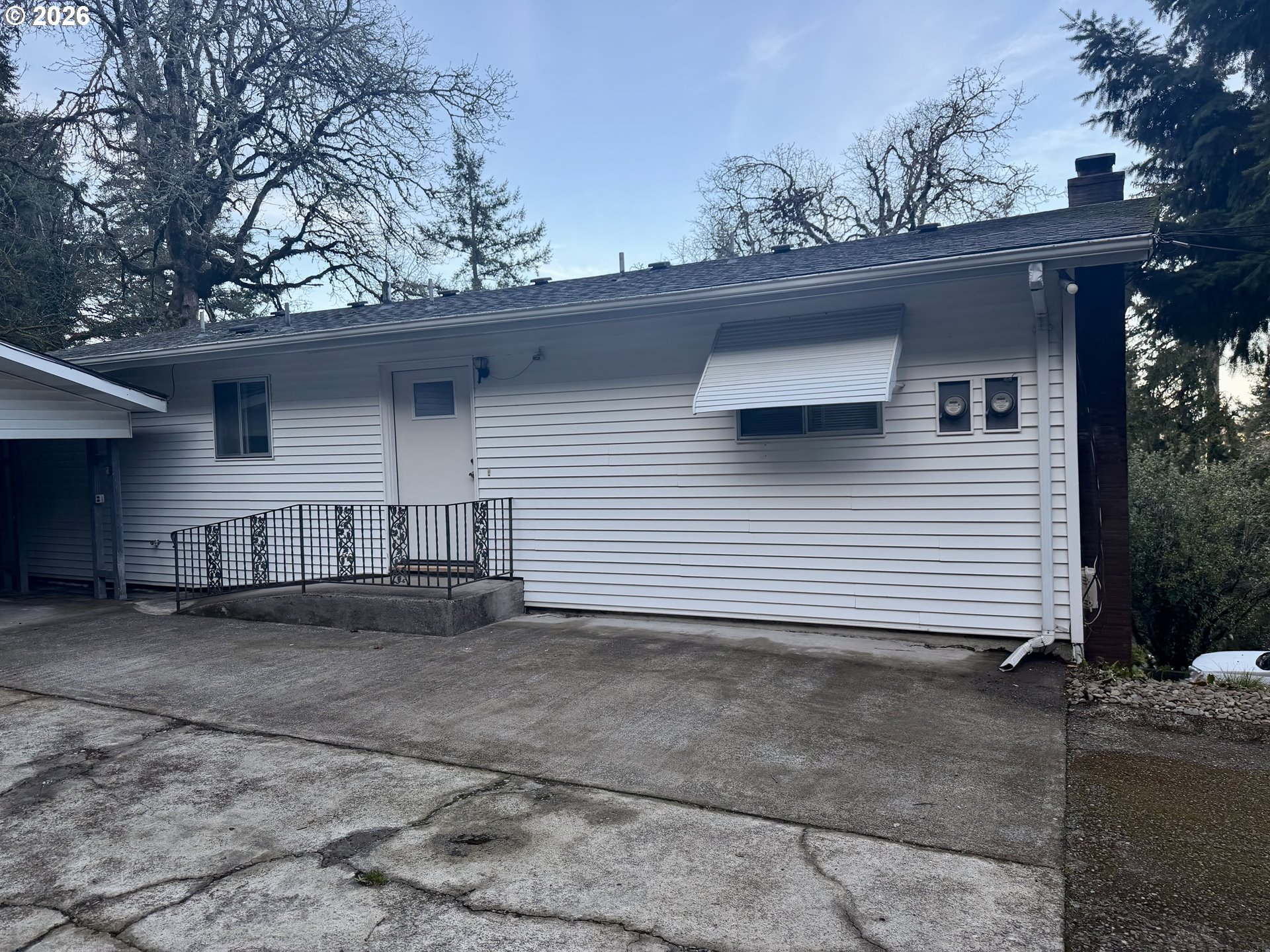 2145 Webb Street West Linn, OR 97068 - Photo 3 of 46 a side view of a house with a garage
