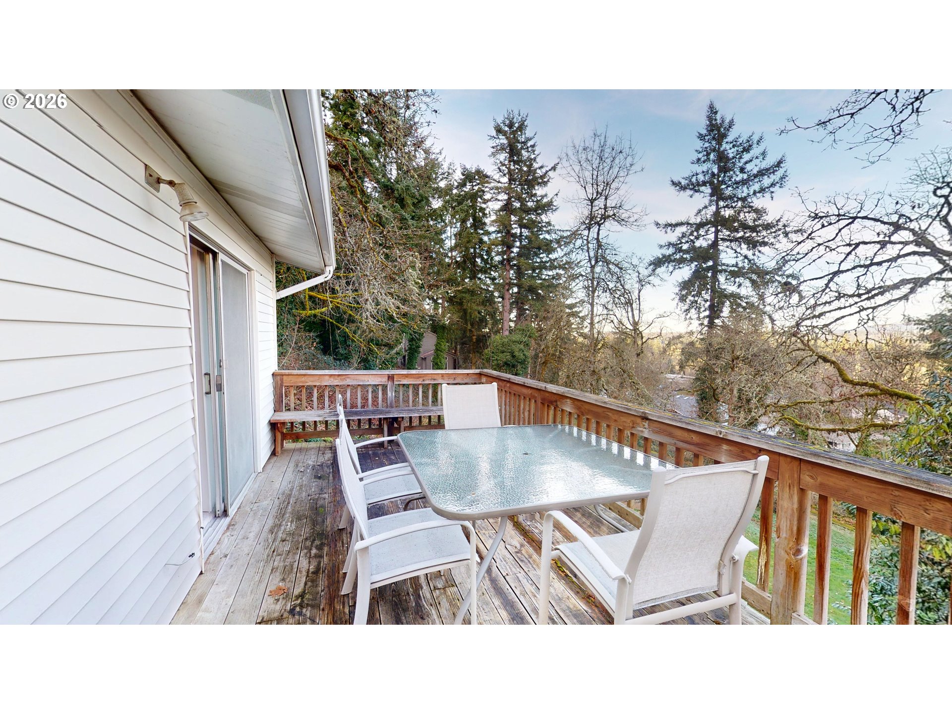 2145 Webb Street West Linn, OR 97068 - Photo 32 of 46 a balcony with table and chairs