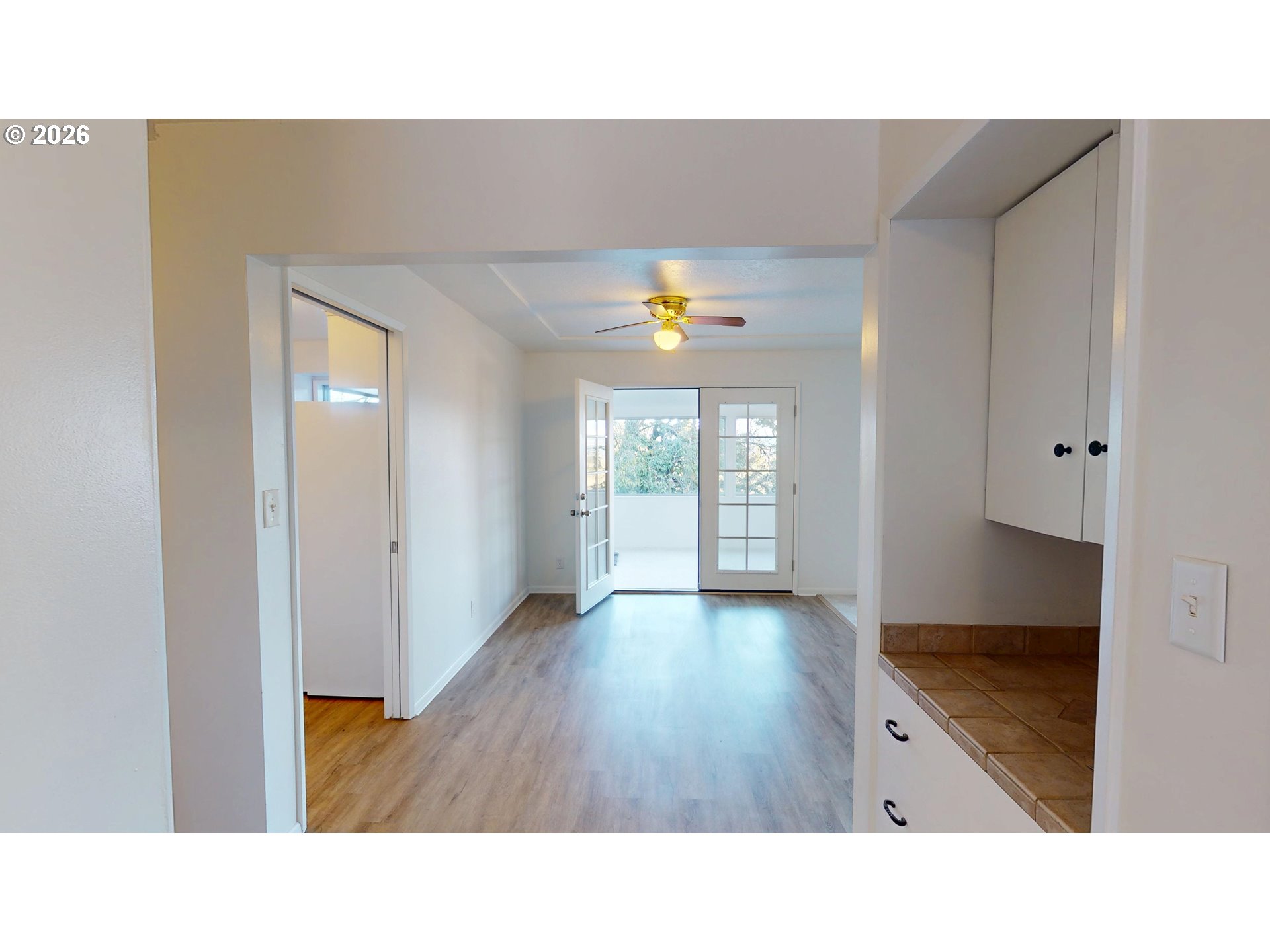 2145 Webb Street West Linn, OR 97068 - Photo 6 of 46 a open hall with wooden floor and cabinet