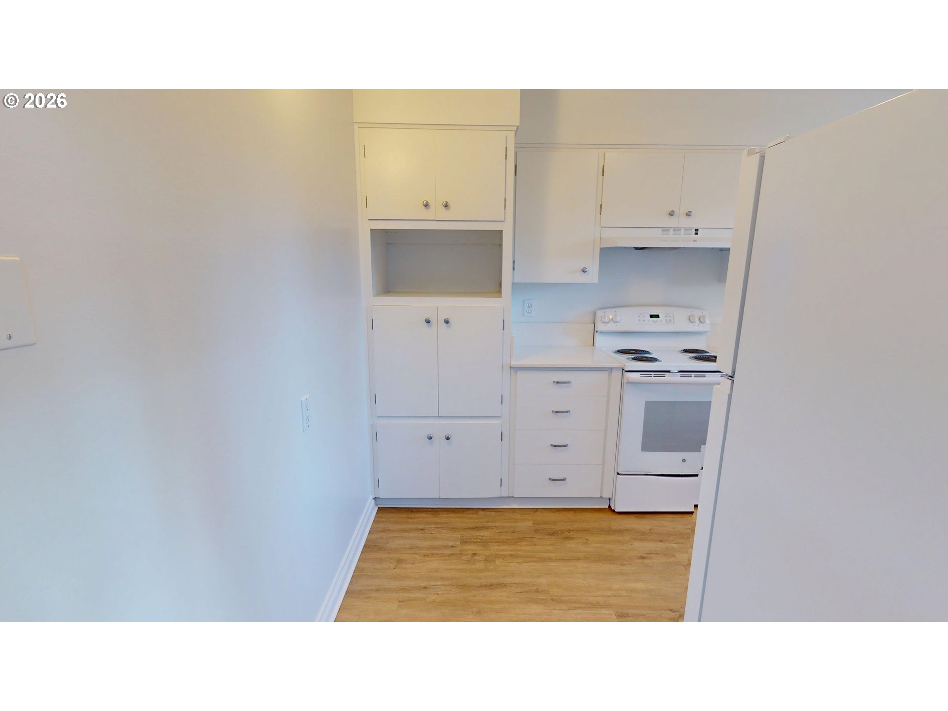 2145 Webb Street West Linn, OR 97068 - Photo 7 of 46 a open kitchen with white cabinets