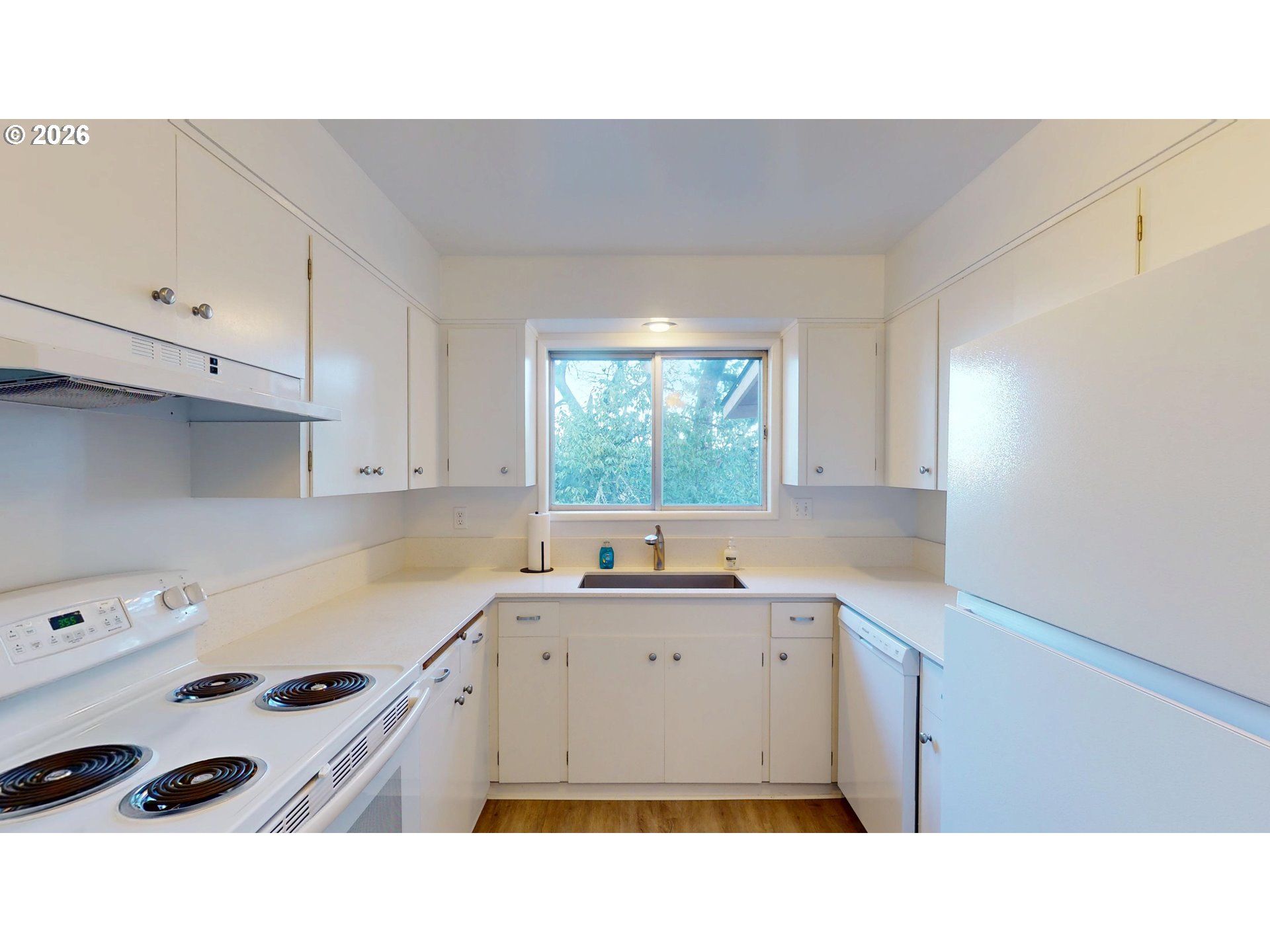 2145 Webb Street West Linn, OR 97068 - Photo 8 of 46 a kitchen with a sink a stove and cabinets