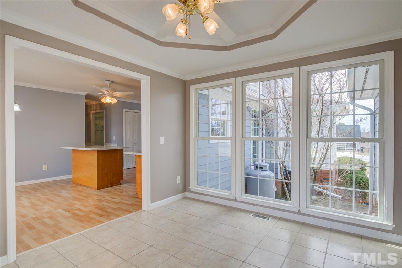 1020 Transom Court Raleigh, NC 27603 - Photo 20 of 30 wooden floor in an empty room with a window