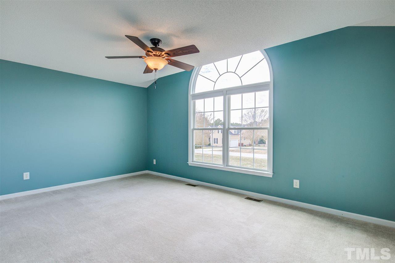 1020 Transom Court Raleigh, NC 27603 - Photo 25 of 30 an empty room with a window