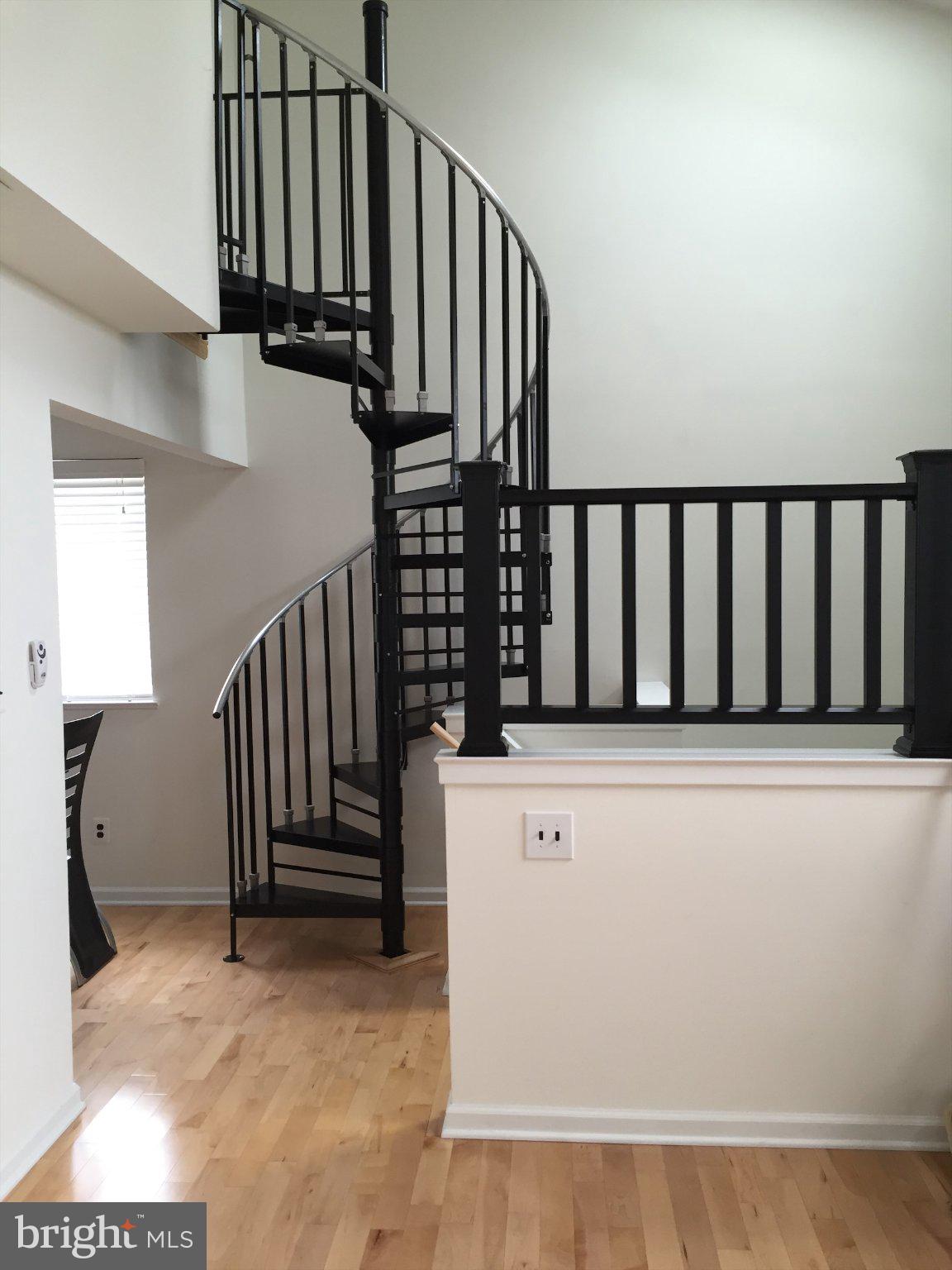 1902 Roberts Way Voorhees, NJ 08043 - Photo 6 of 6 Spiral staircase adds modern flair.
