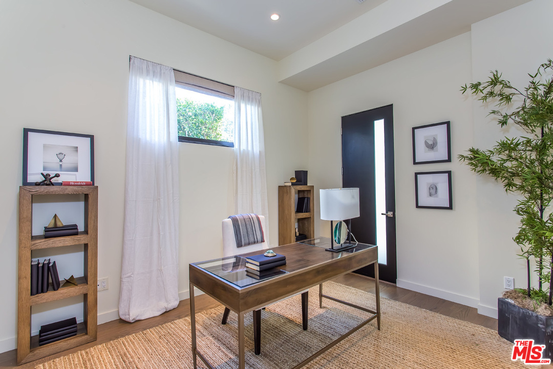 6533 Colgate Avenue Los Angeles, CA 90048 - Photo 12 of 19 a view of a workspace with furniture and a potted plant