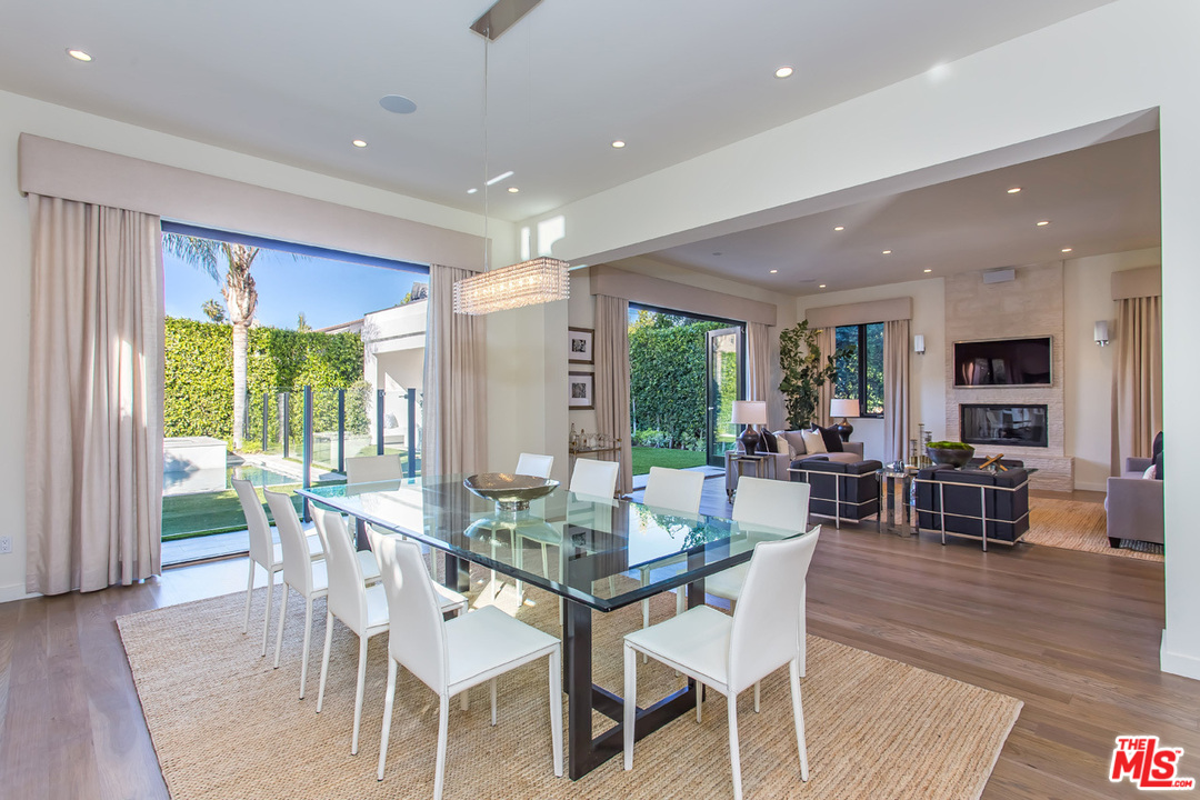 6533 Colgate Avenue Los Angeles, CA 90048 - Photo 14 of 19 a view of a dining room with furniture window and wooden floor