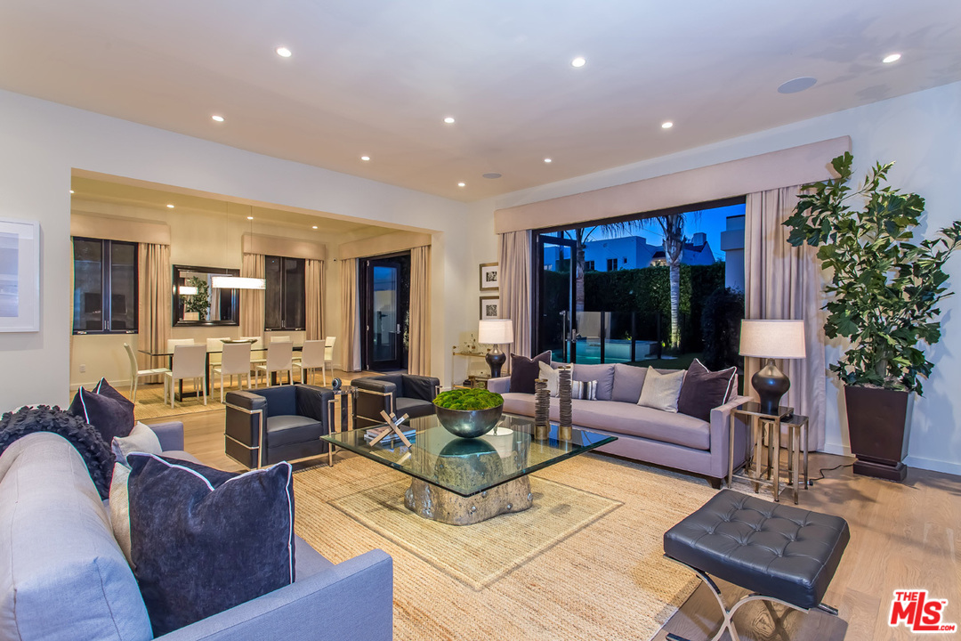 6533 Colgate Avenue Los Angeles, CA 90048 - Photo 4 of 19 a living room with furniture potted plant and a large window