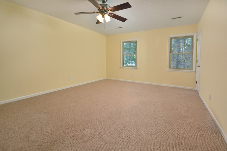 5418 Russell Road Durham, NC 27712 - Photo 17 of 30 Master bedroom with two walk-in closets