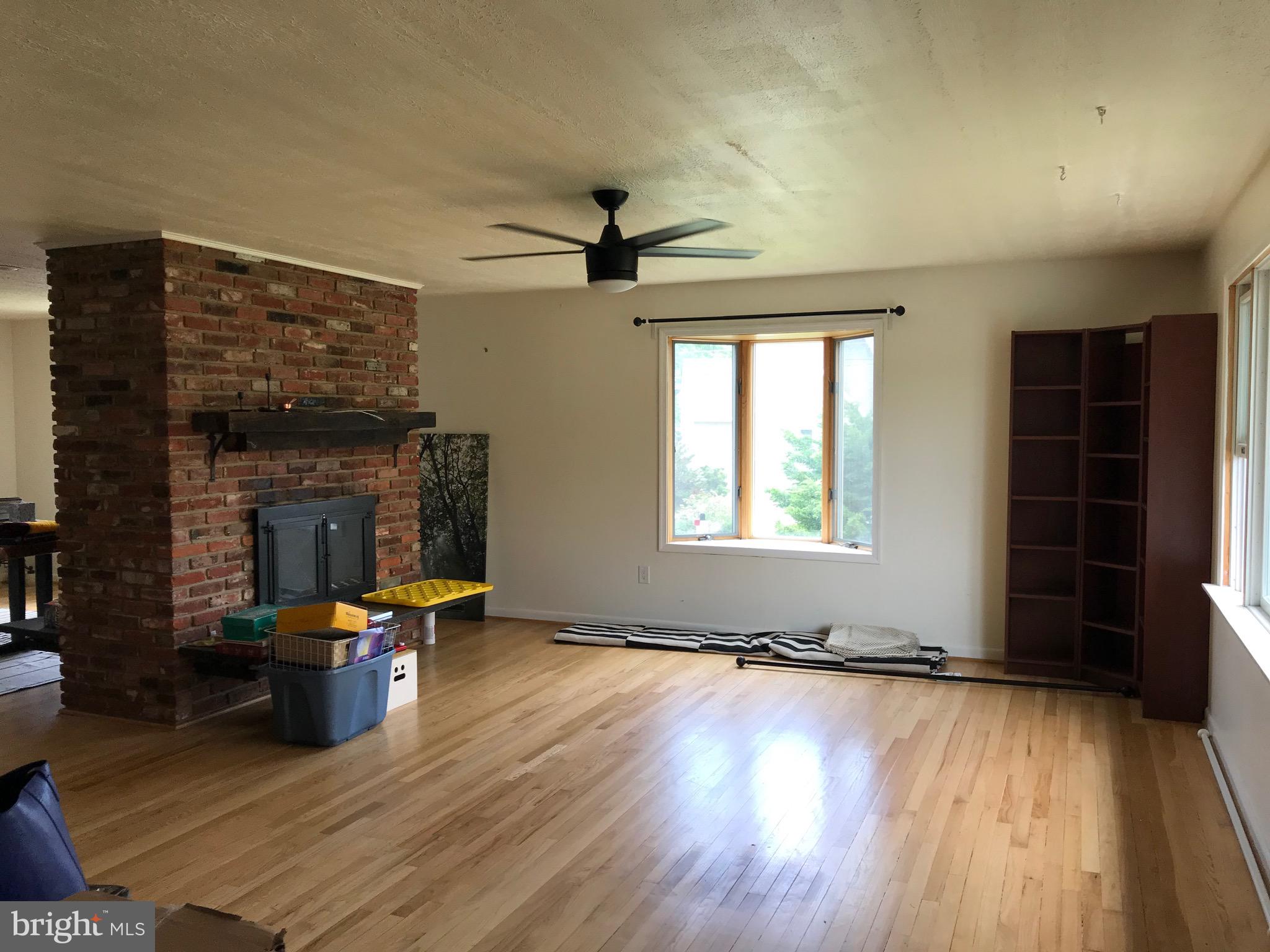 1550 Ridgely Drive Edgewater, MD 21037 - Photo 4 of 22 Liv rm w/ double-sided fireplace
