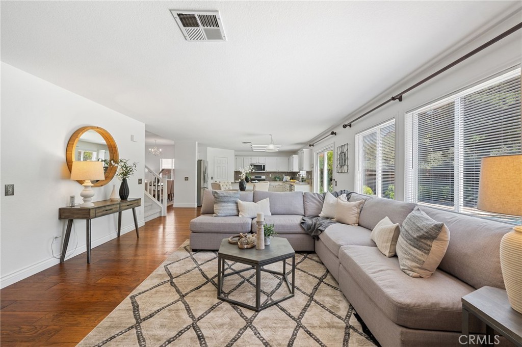 33751 Abbey Road Temecula, CA 92592 - Photo 18 of 41 a living room with furniture and a wooden floor