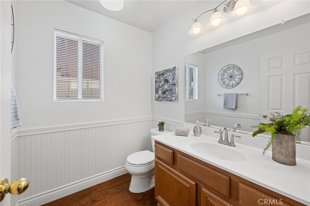 33751 Abbey Road Temecula, CA 92592 - Photo 19 of 41 a bathroom with a sink a vanity and a toilet