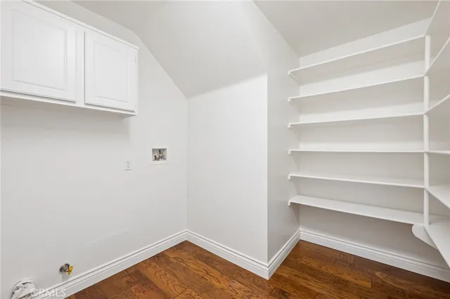 a bathroom with a sink a mirror and a shower