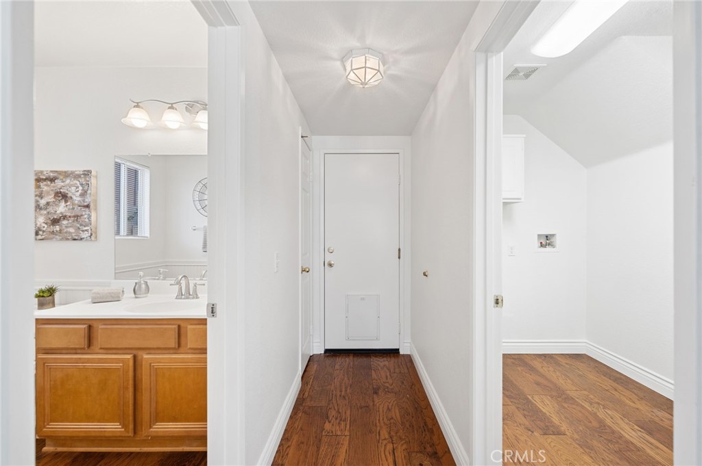 33751 Abbey Road Temecula, CA 92592 - Photo 21 of 41 a bathroom with a sink a mirror and a shower