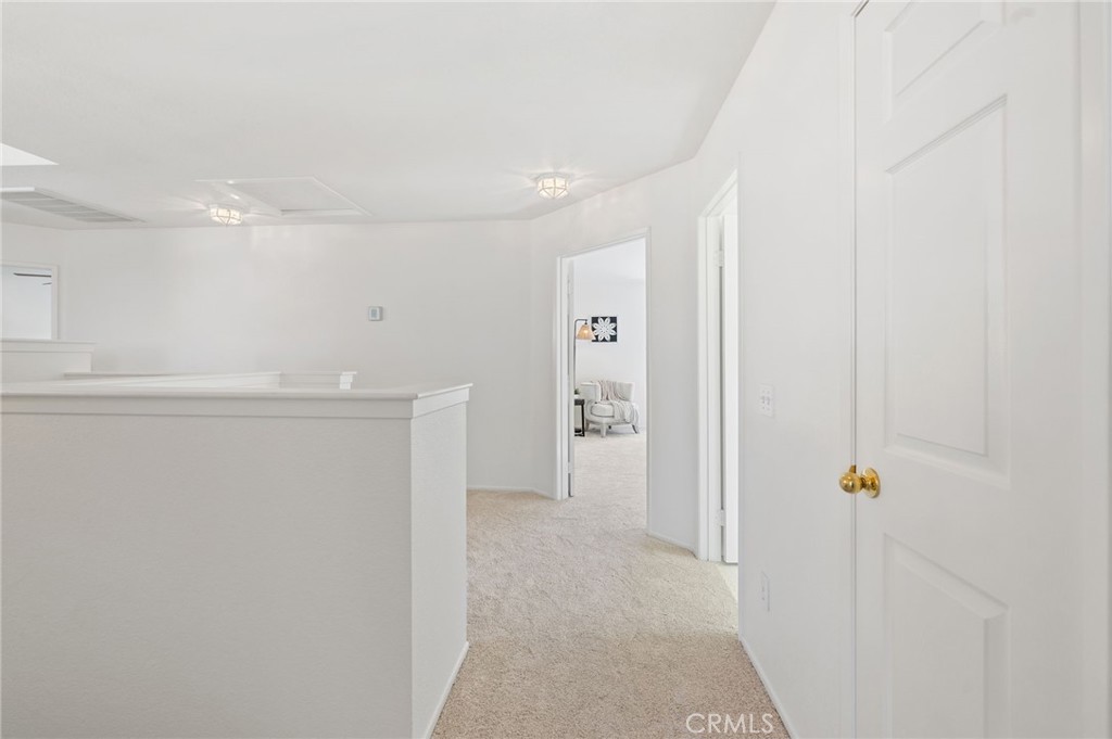 33751 Abbey Road Temecula, CA 92592 - Photo 24 of 41 a view of a hallway with closet