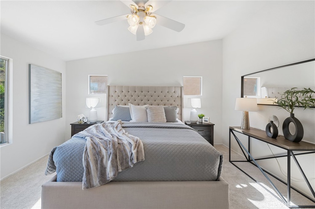 33751 Abbey Road Temecula, CA 92592 - Photo 27 of 41 a bedroom with a bed and chair