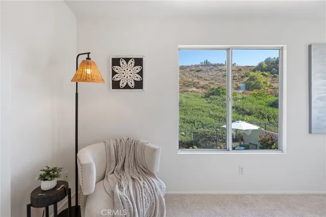 a white bath tub sitting next to a window