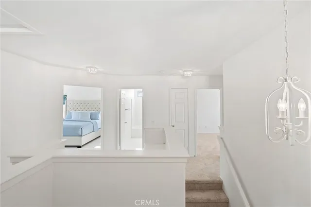 a view of swimming pool with seating area and green space