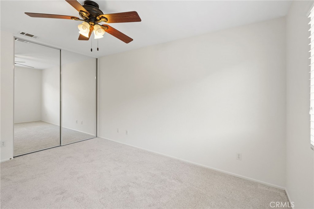 33751 Abbey Road Temecula, CA 92592 - Photo 37 of 41 en empty room with fan