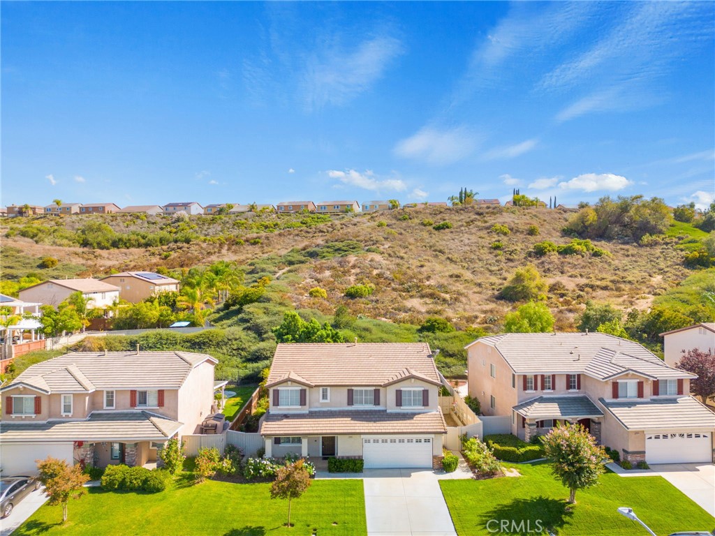 33751 Abbey Road Temecula, CA 92592 - Photo 4 of 41 an aerial view of residential houses with outdoor space