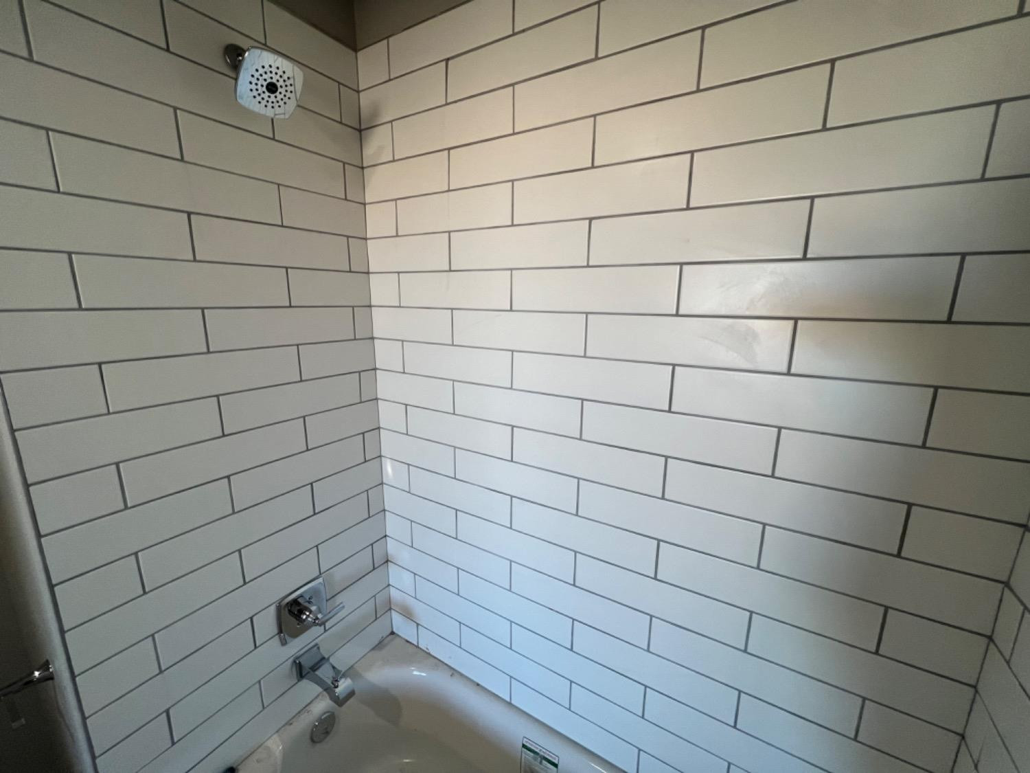 1407 17th Street, Unit AB Shallowater, TX 79363 - Photo 25 of 33 a bathroom with a shower