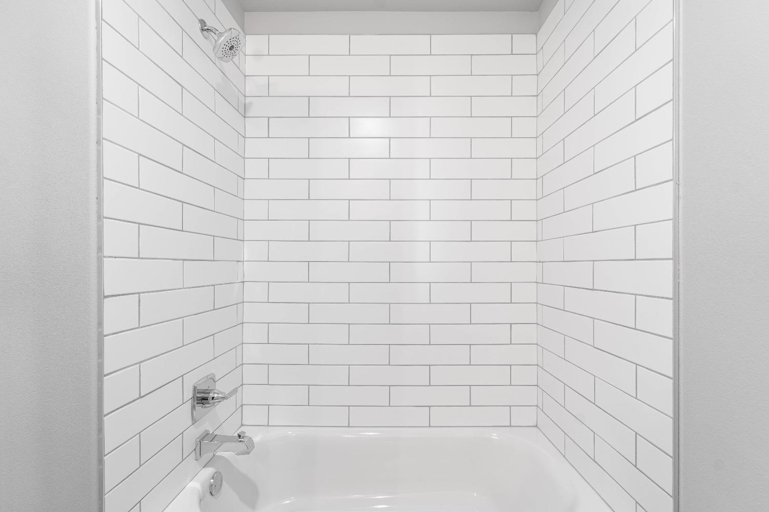 1407 17th Street, Unit AB Shallowater, TX 79363 - Photo 10 of 33 a bathroom with a shower
