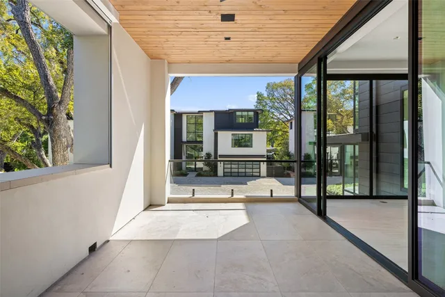 a view of a kitchen with a sink and a window