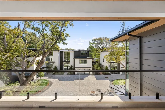 a view of a building from a balcony