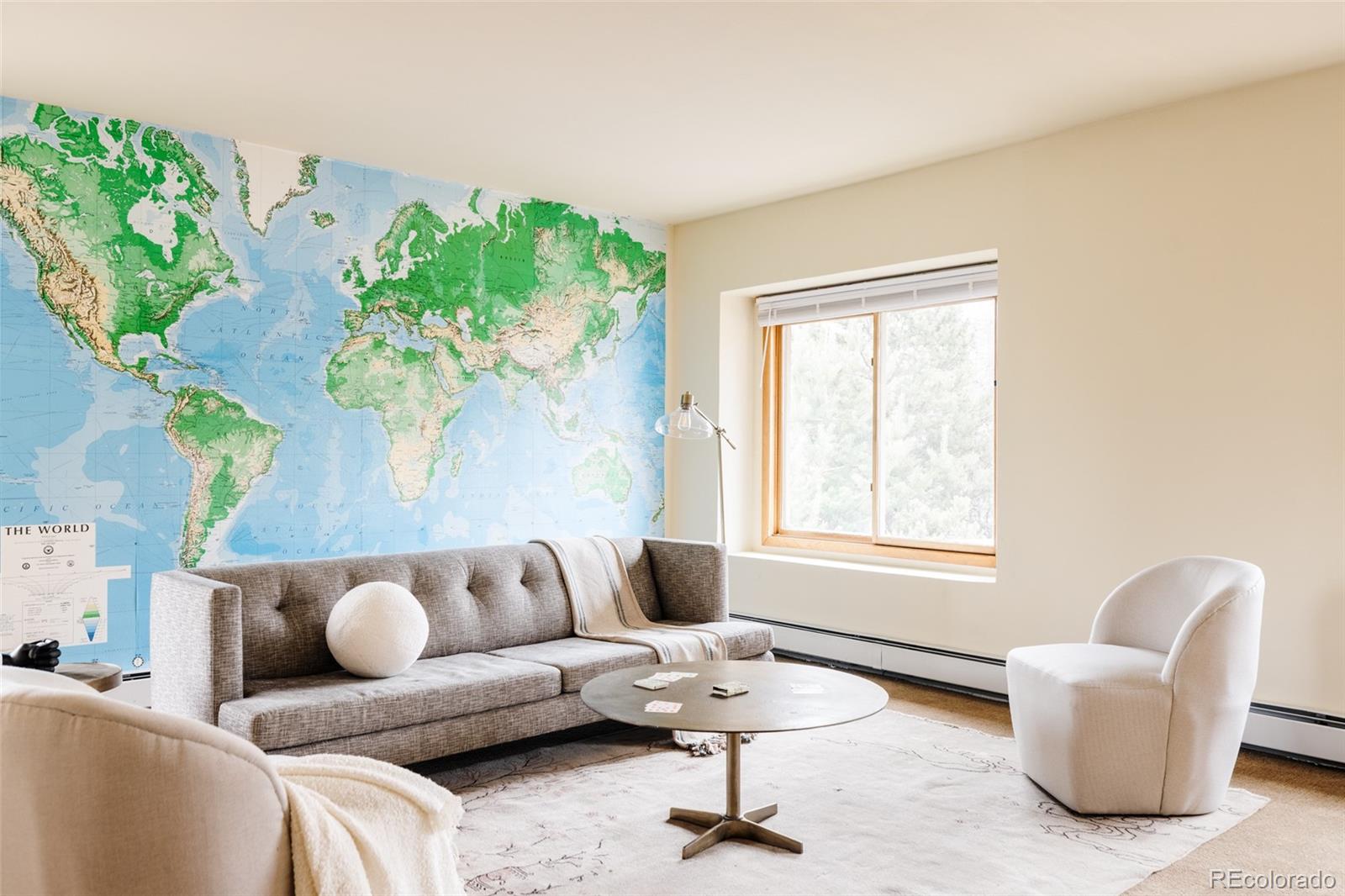 14080 Crabapple Road Golden, CO 80401 - Photo 36 of 50 a living room with furniture and a window