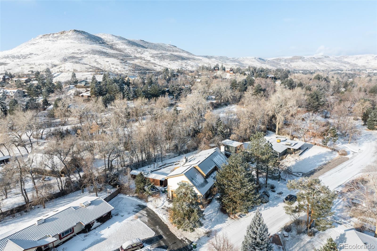 14080 Crabapple Road Golden, CO 80401 - Photo 45 of 50 an aerial view of mountain with yard and mountain view in back