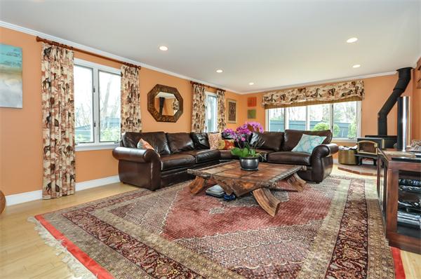 3 Wildon Road Wellesley, MA 02482 - Photo 12 of 27 a living room with furniture and a large window