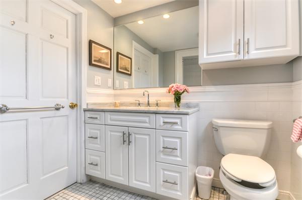 3 Wildon Road Wellesley, MA 02482 - Photo 13 of 27 a bathroom with a toilet sink and mirror