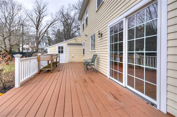 3 Wildon Road Wellesley, MA 02482 - Photo 23 of 27 a view of a roof deck with wooden floor and fence