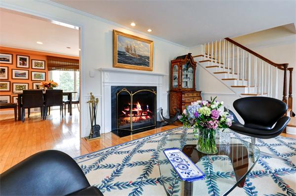3 Wildon Road Wellesley, MA 02482 - Photo 3 of 27 a living room with furniture and a fireplace