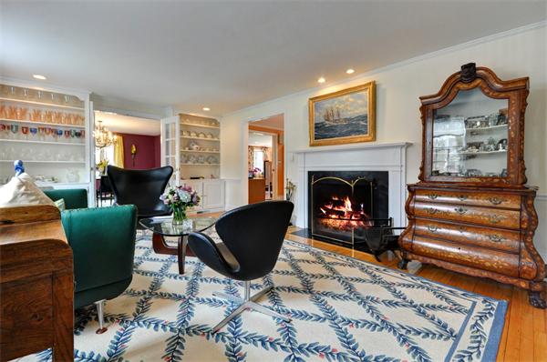 3 Wildon Road Wellesley, MA 02482 - Photo 4 of 27 a living room with furniture and a fireplace