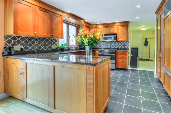 3 Wildon Road Wellesley, MA 02482 - Photo 6 of 27 a kitchen with stainless steel appliances a sink and a refrigerator