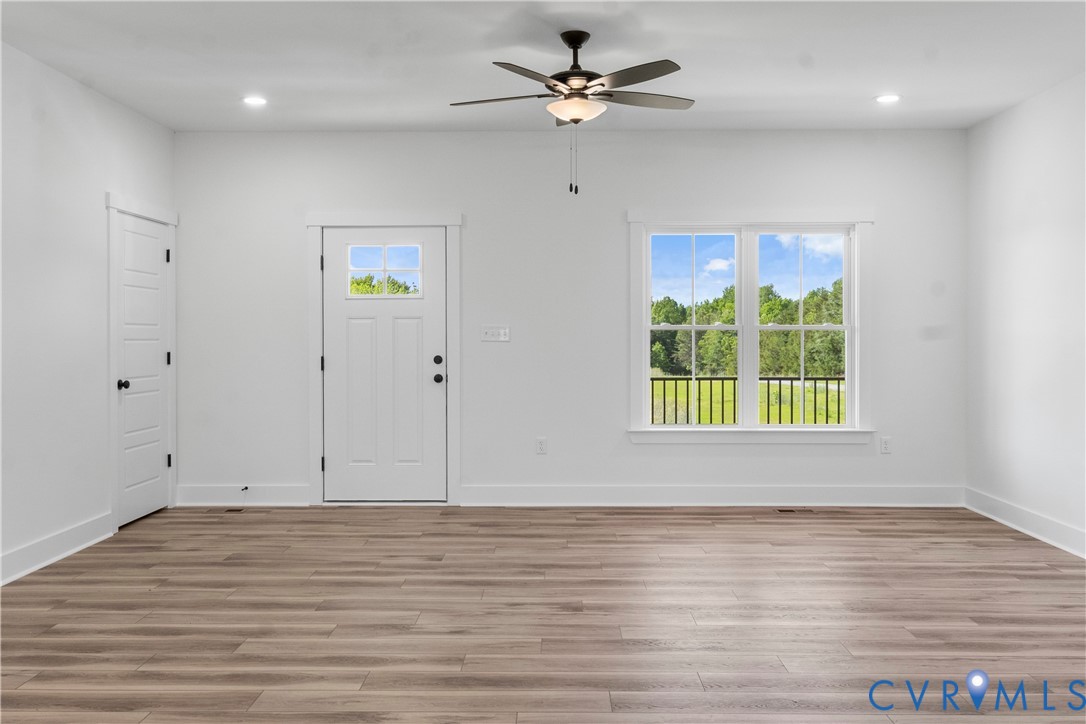 1841 Cartersville Road Goochland, VA 23063 - Photo 5 of 34 a view of room with window ceiling fan and hardwood floor